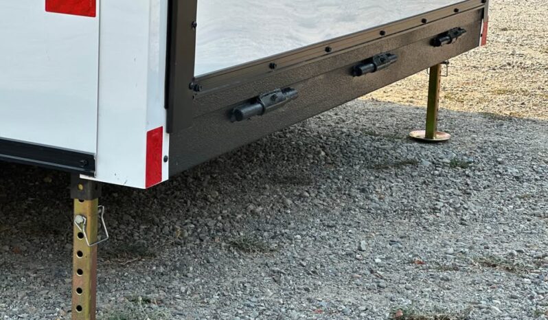 
								2026 Haulmark Nomad 7×16 V-Nose Camper/Toy Hauler Hybrid Trailer full									