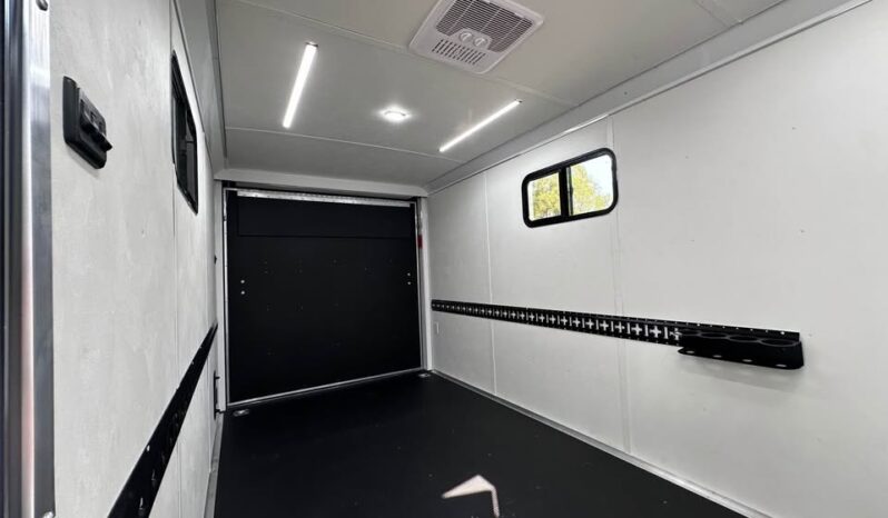 
								2026 Haulmark Nomad 7×16 V-Nose Camper/Toy Hauler Hybrid Trailer full									