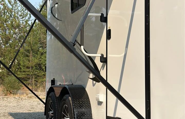 
								2026 Haulmark Nomad 7×16 V-Nose Camper/Toy Hauler Hybrid Trailer full									