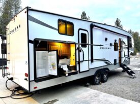 2023 Keystone Cougar 32BHS| Bunk Room | 1.5 Bath | Outdoor Kitchen | Sleeps 11!