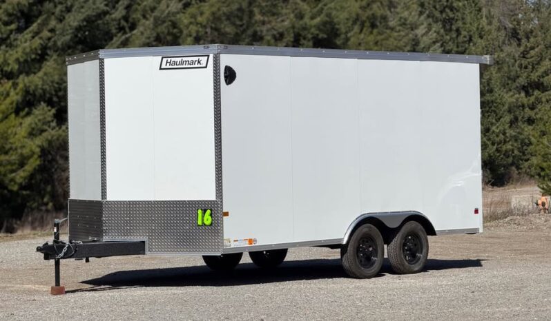 2026 Haulmark 8.5×16 ATV Trailer | 7′ Tall | 24″ Beavertail | Lifted 3.5k Torflex Axles
