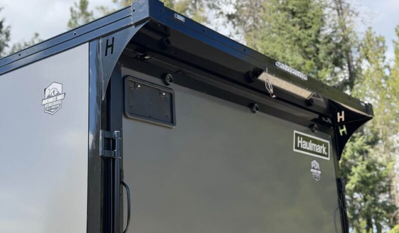 2026 Haulmark 8.5×16 UTV Trailer | DS Man Door | 90″ H | E-Tracks | 2k Rear Stab Jacks