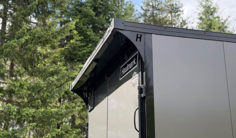 2026 Haulmark 8.5×28 Snowmobile Trailer | Lifted 5.2k Torflex Axles | Polybead Flooring | RV Window