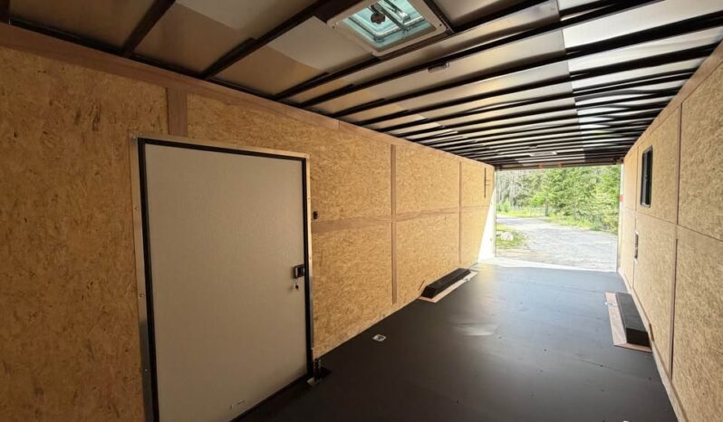 2026 Haulmark 8.5×28 Snowmobile Trailer | Lifted 5.2k Torflex Axles | Polybead Flooring | RV Window