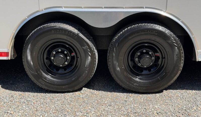 
								2026 Haulmark 8.5×24 Cargo Trailer | Heavy Duty 7k Torsion Tandem Axle | 90″ H | 12″ OC Floor full									