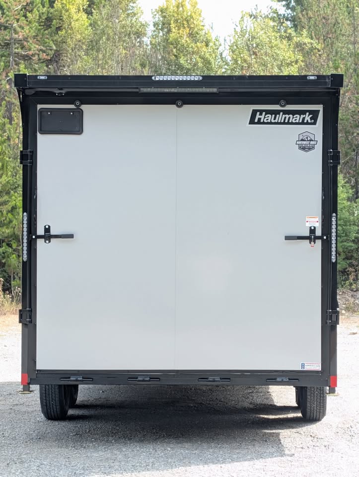2027 Haulmark Transport 8.5×18 Car Cargo Trailer | 7’6″ Tall | Polybead Floor | Lifted 5.2k Torsion Axles - Image 13